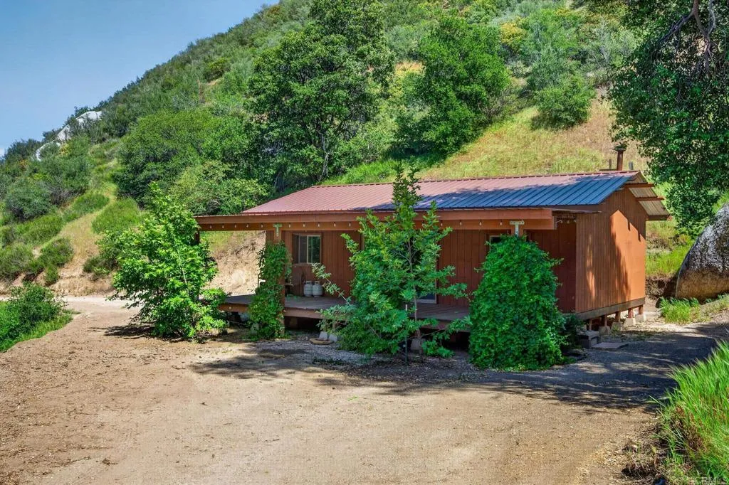 63 San Felipe Road Warner Springs, CA 92086 - Photo 15 of 43 a front view of a house with garden