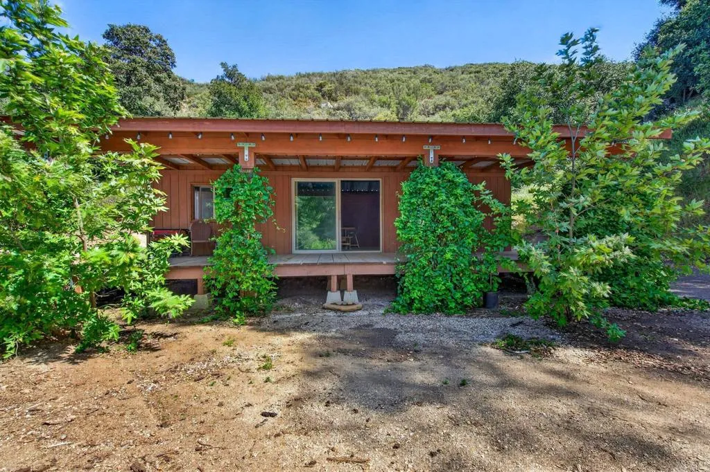 63 San Felipe Road Warner Springs, CA 92086 - Photo 25 of 43 front view of a house with a yard