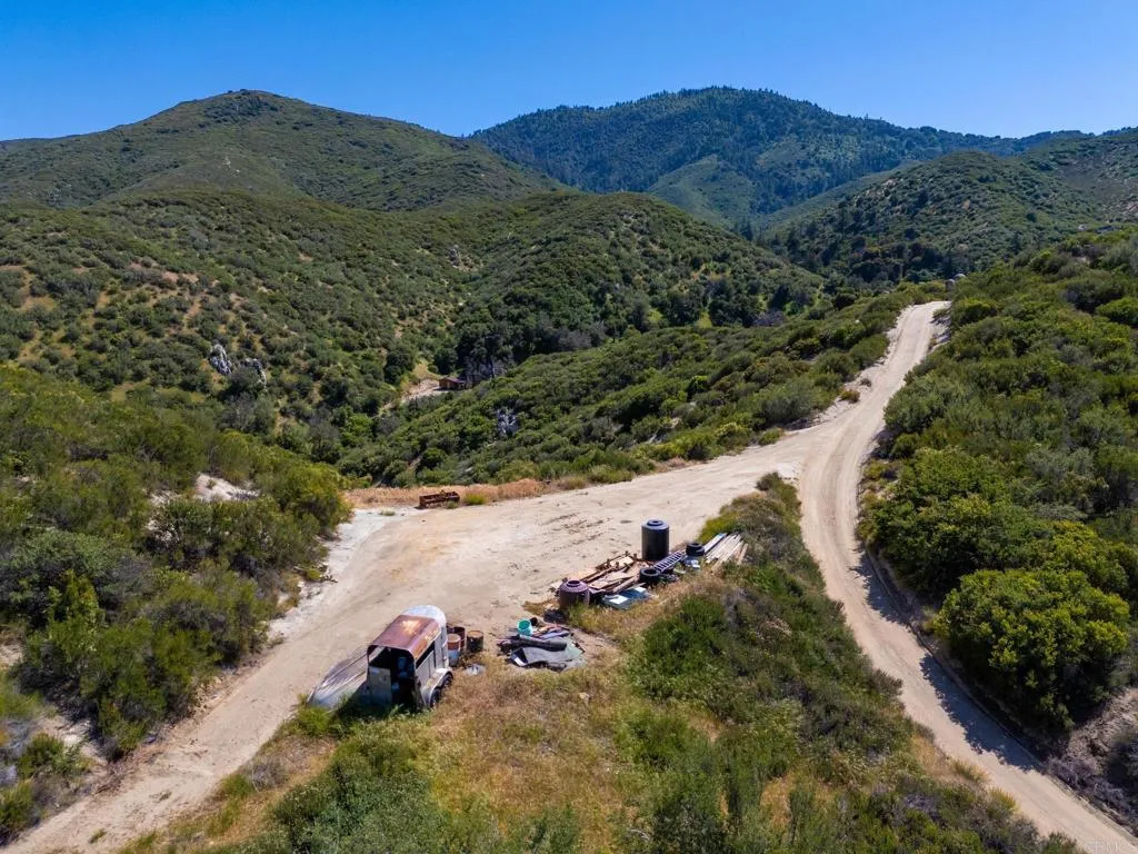 63 San Felipe Road Warner Springs, CA 92086 - Photo 39 of 43 an aerial view of mountain with residential house and green space