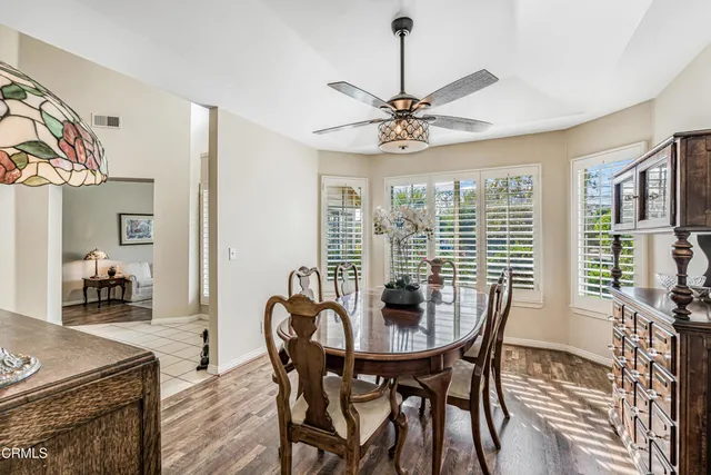 a kitchen with stainless steel appliances granite countertop a refrigerator oven stove top oven and a sink