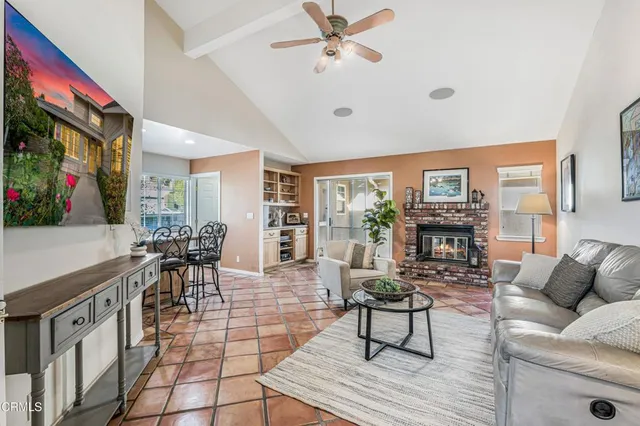 a kitchen with stainless steel appliances granite countertop a stove sink and cabinets