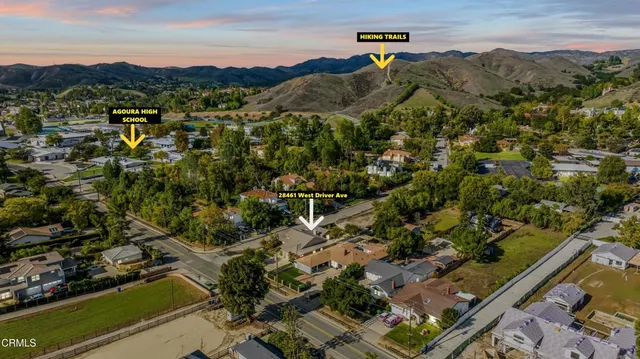 a view of street with parked cars