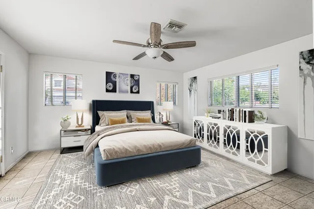 an aerial view of residential houses with outdoor and green space