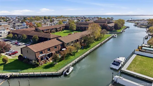 a view of swimming pool with seating area