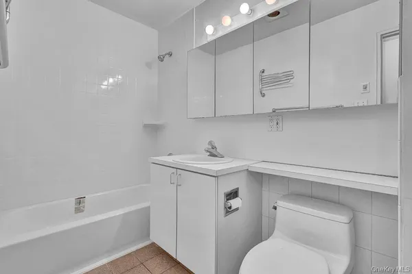 a view of a swimming pool with a yard