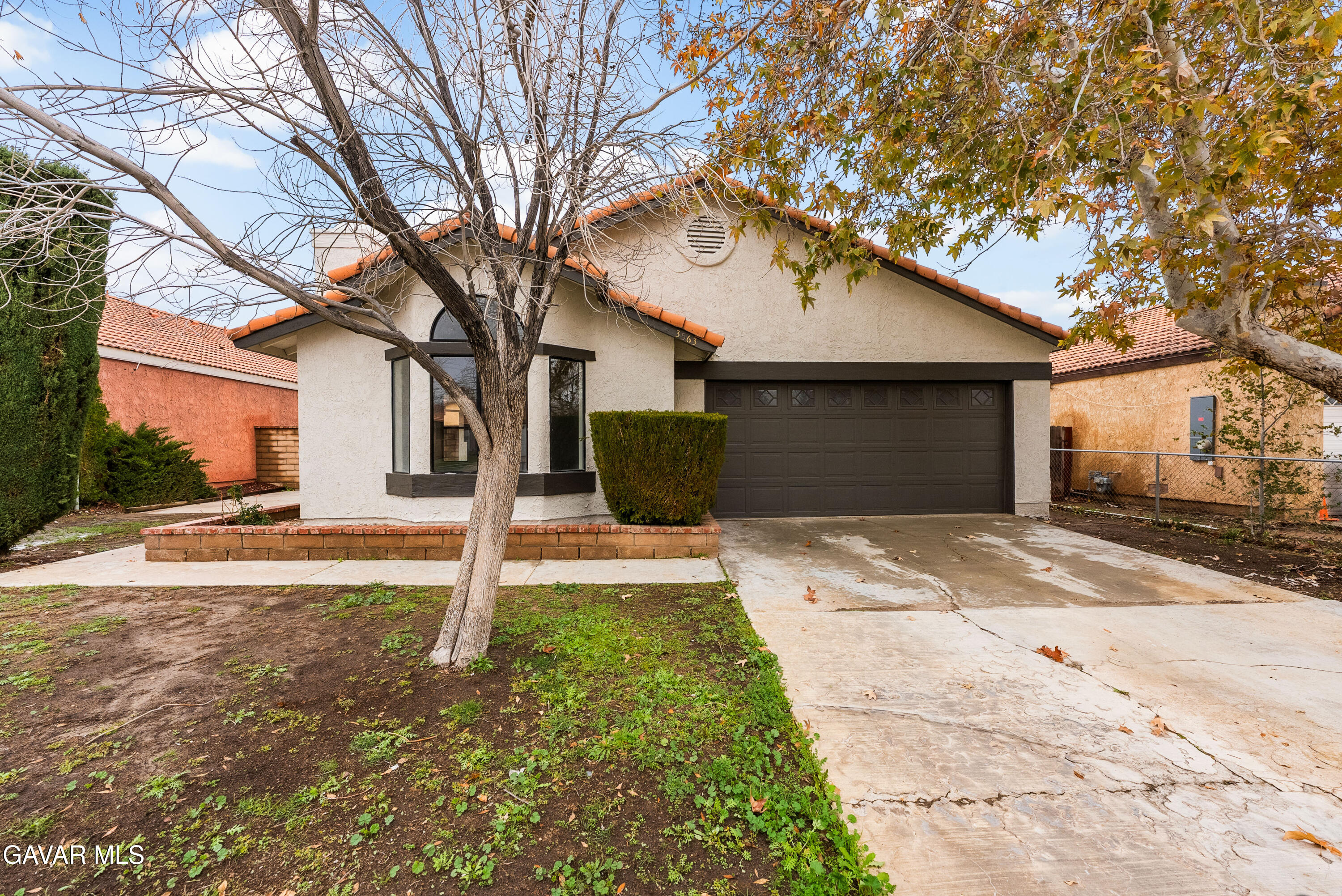3563 Avenue R11 E Palmdale Ca East Palmdale, CA 93550 - Photo 2 of 37 a front view of a house with a yard