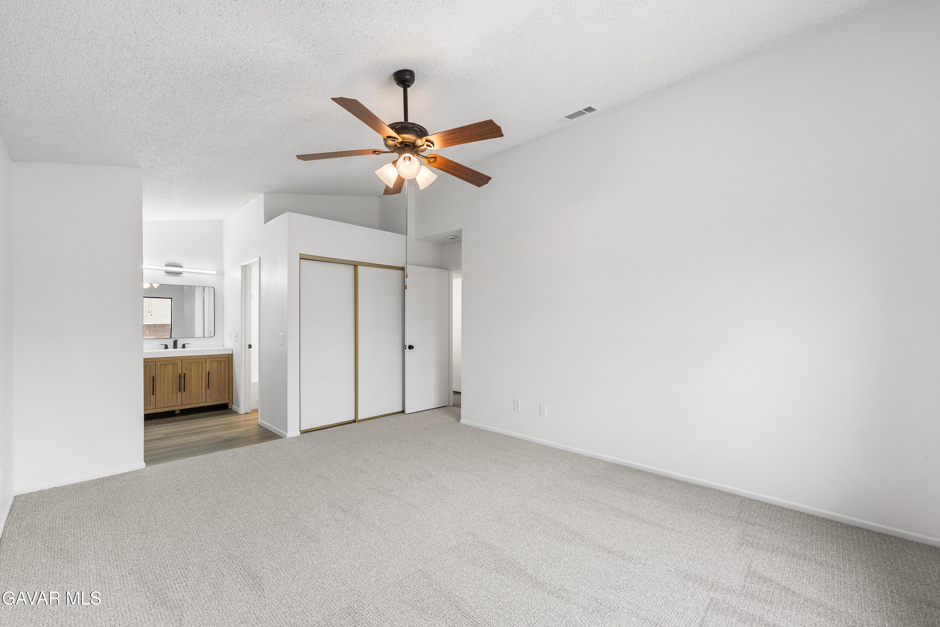 3563 Avenue R11 E Palmdale Ca East Palmdale, CA 93550 - Photo 24 of 37 a view of empty room with a ceiling fan and window