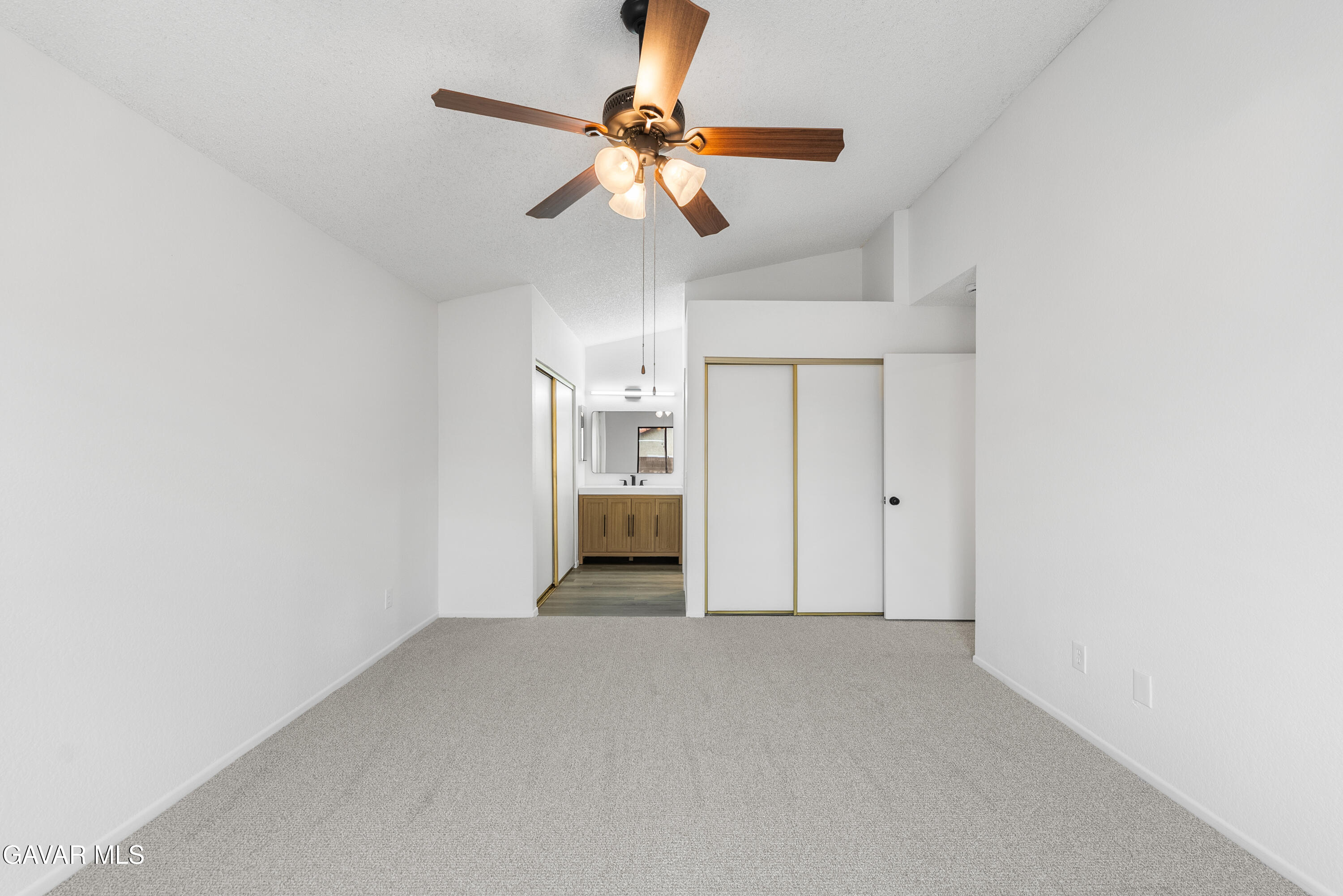 3563 Avenue R11 E Palmdale Ca East Palmdale, CA 93550 - Photo 25 of 37 a view of a room with a ceiling fan and window