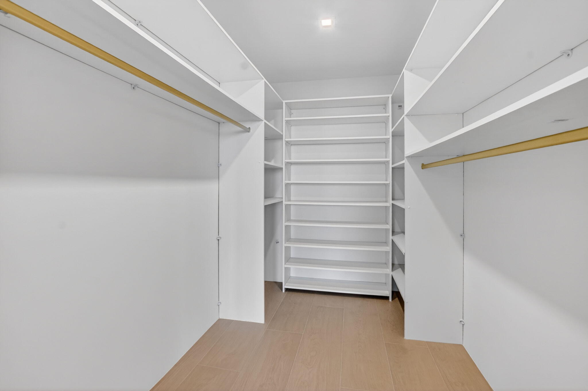 2800 South Ocean Boulevard, Unit 23C Boca Raton, FL 33432 - Photo 34 of 50 a view of closet area with empty racks