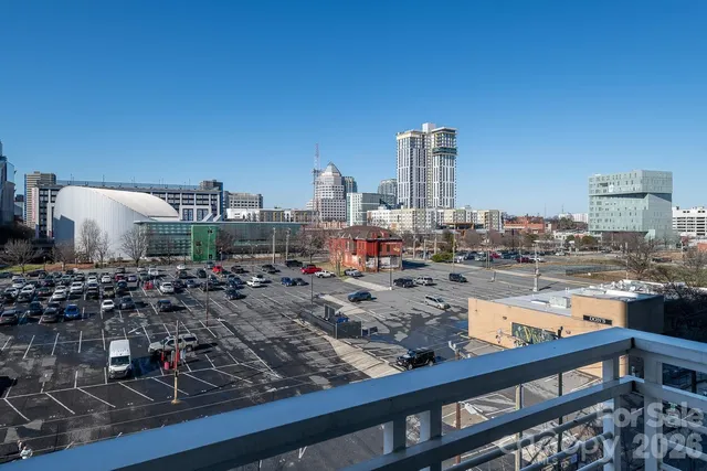 a view of swimming pool from a balcony