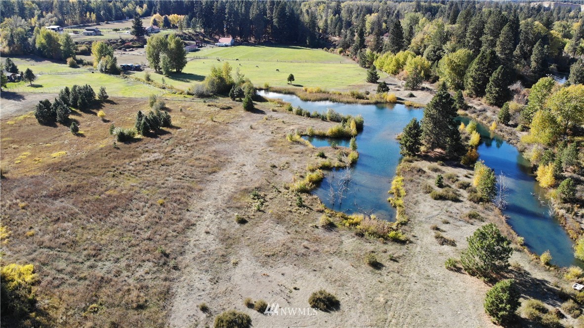 0 Westside Road Cle Elum, WA 98922 - Photo 19 of 31 a view of swimming pool with a yard and seating area