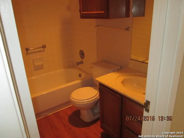 a bathroom with a sink and a bathtub