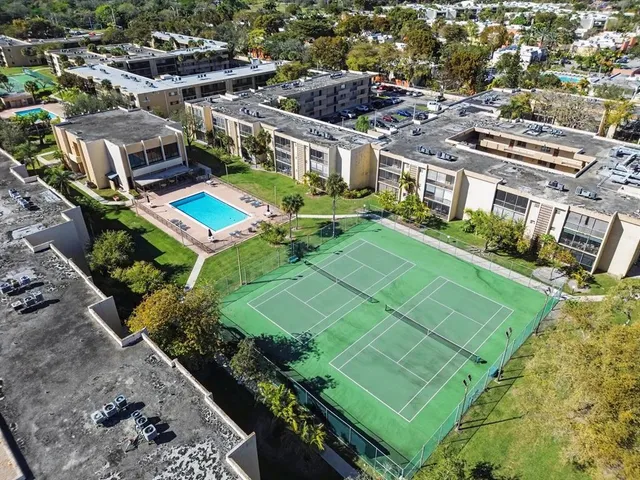 an aerial view of a house with a garden