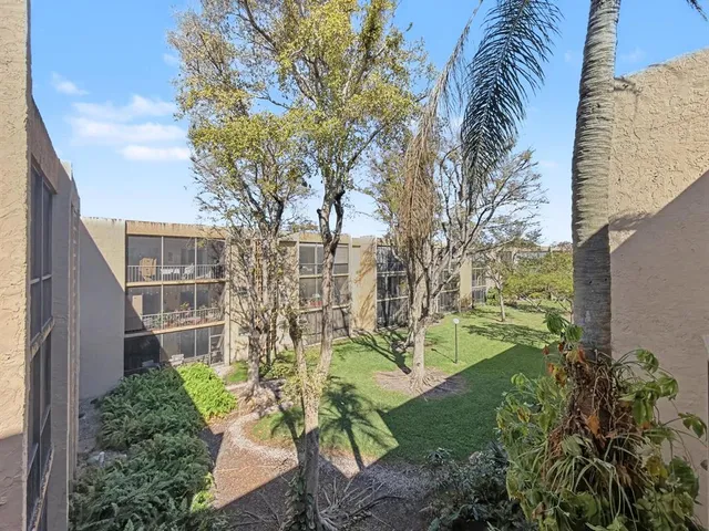a view of a yard in front of a house