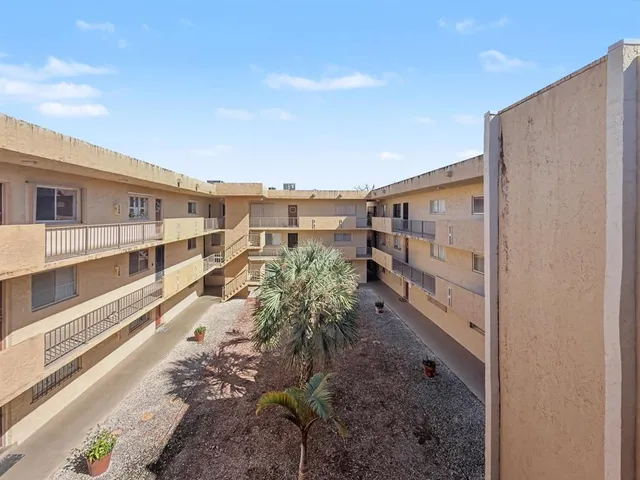 a view of a balcony with an outdoor space