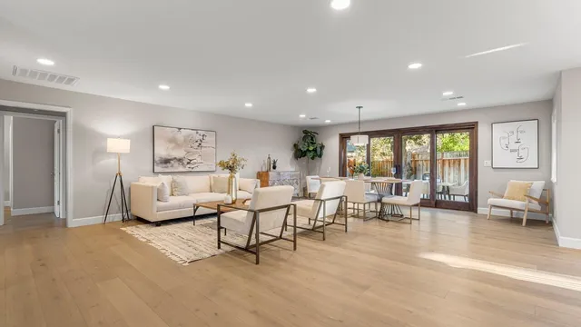 a view of a dining room with furniture window and outside view