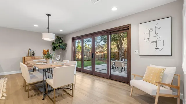 a kitchen with cabinets appliances a sink and a counter top space