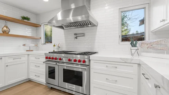 a bedroom with a bed and a chair