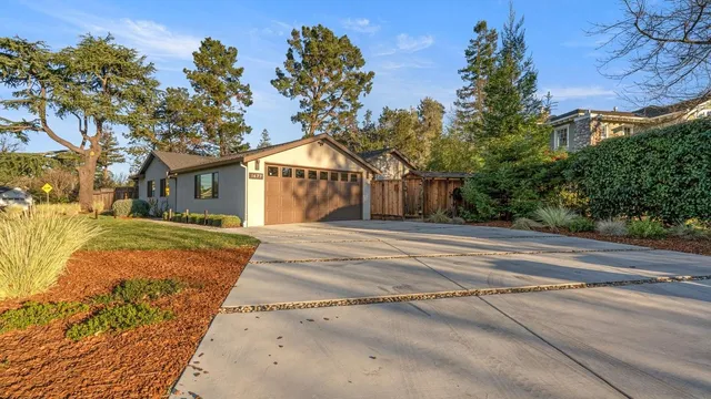 a house view with a garden space