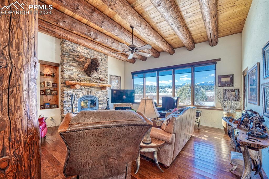 1328 Round Up Road Westcliffe, CO 81252 - Photo 19 of 50 a living room with furniture and a large window