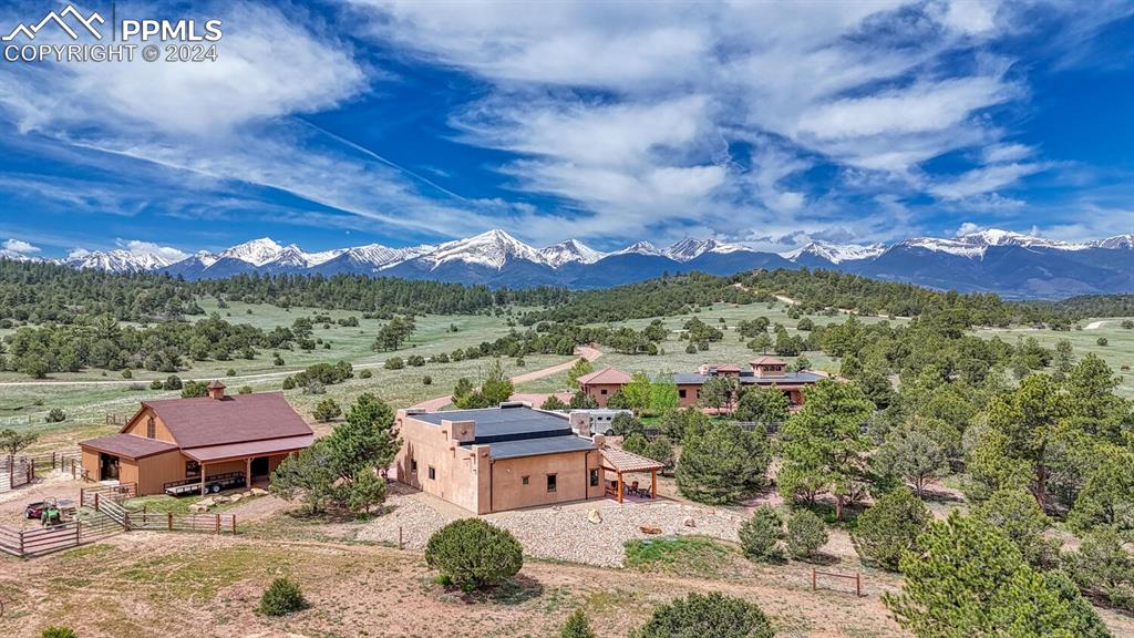1328 Round Up Road Westcliffe, CO 81252 - Photo 6 of 50 a view of a city with a lake
