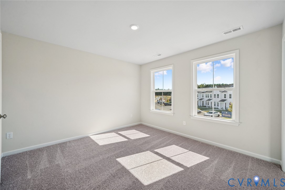 344 Mt Mccauley Way Aylett, VA 23009 - Photo 11 of 33 a view of an empty room and window