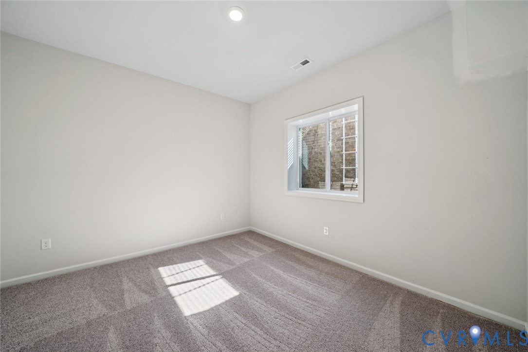 344 Mt Mccauley Way Aylett, VA 23009 - Photo 16 of 33 an empty room with a window