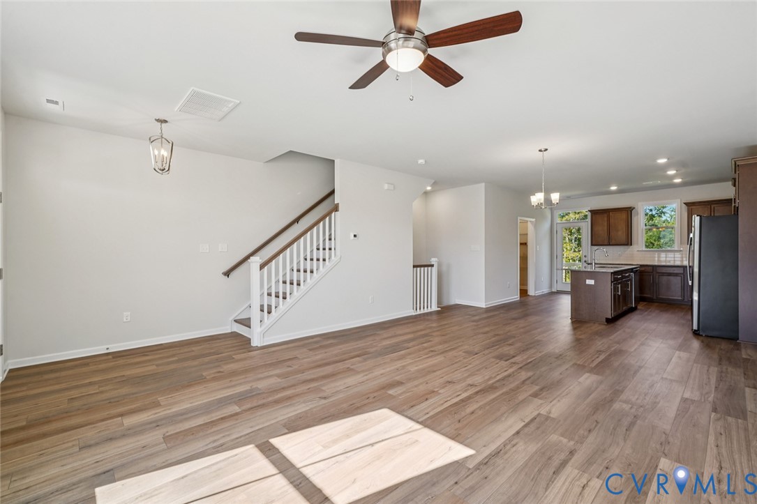 344 Mt Mccauley Way Aylett, VA 23009 - Photo 8 of 33 a view of a hallway with a kitchen