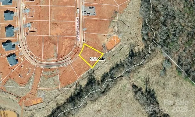 an aerial view of a house with a garden