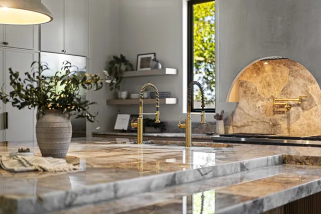 a vase of flowers sitting on a table