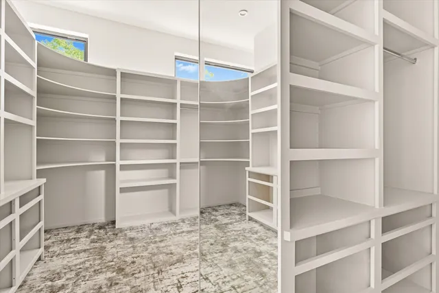 a view of an empty walk in closet