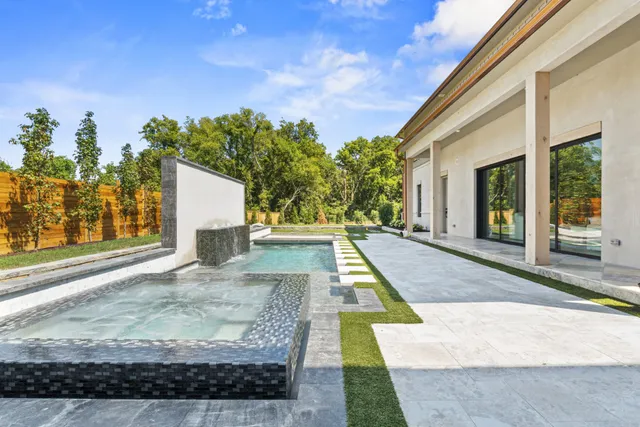 a view of a backyard of a house