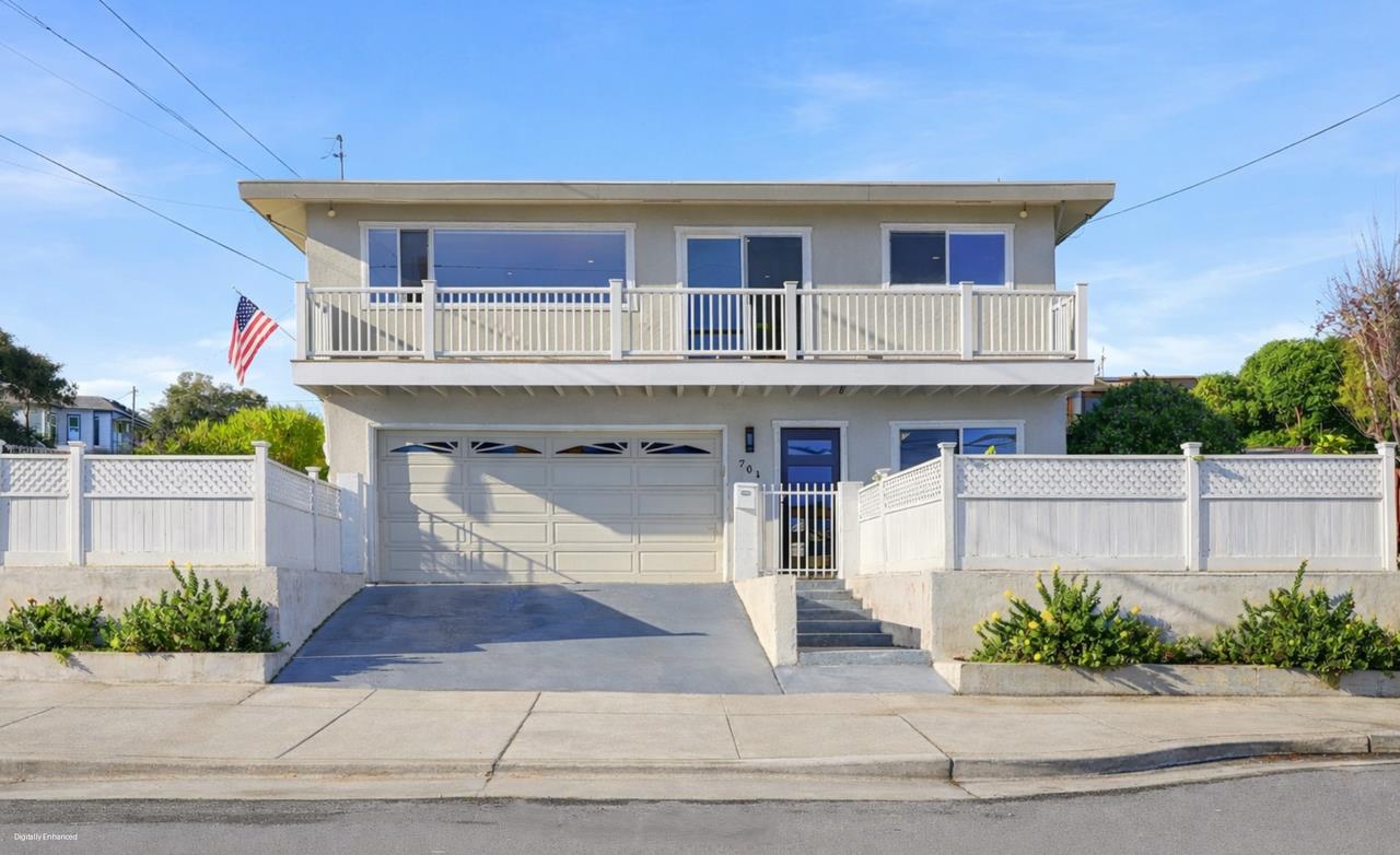 701 Archer Street Monterey, CA 93940 - Photo 1 of 39 a front view of a house with a garden