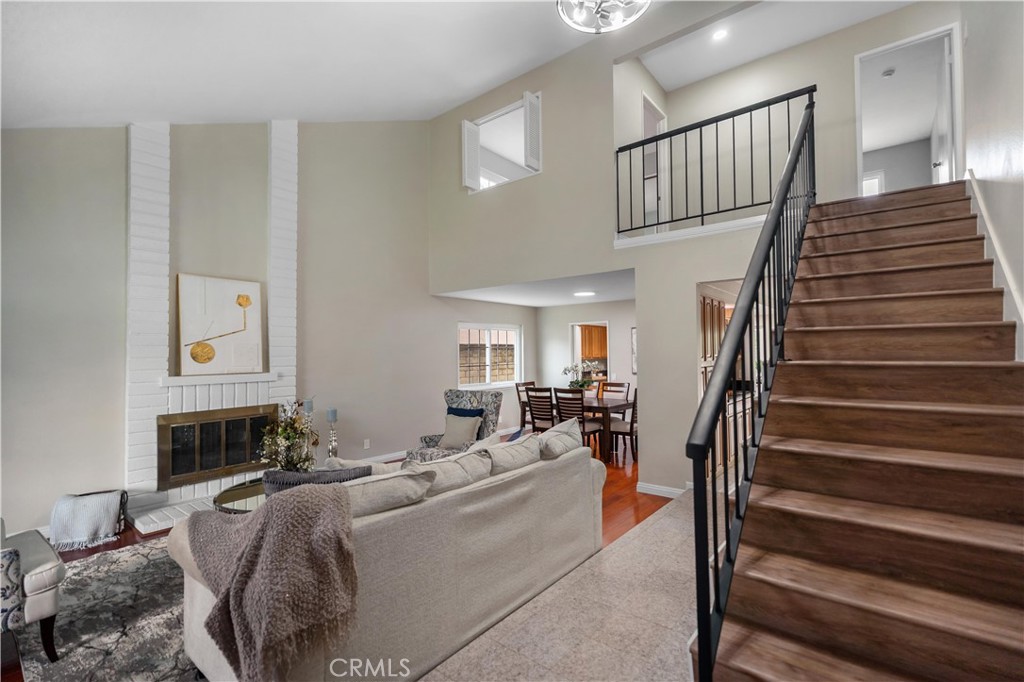 697 Farben Drive Diamond Bar, CA 91765 - Photo 11 of 54 a living room with furniture and stairs