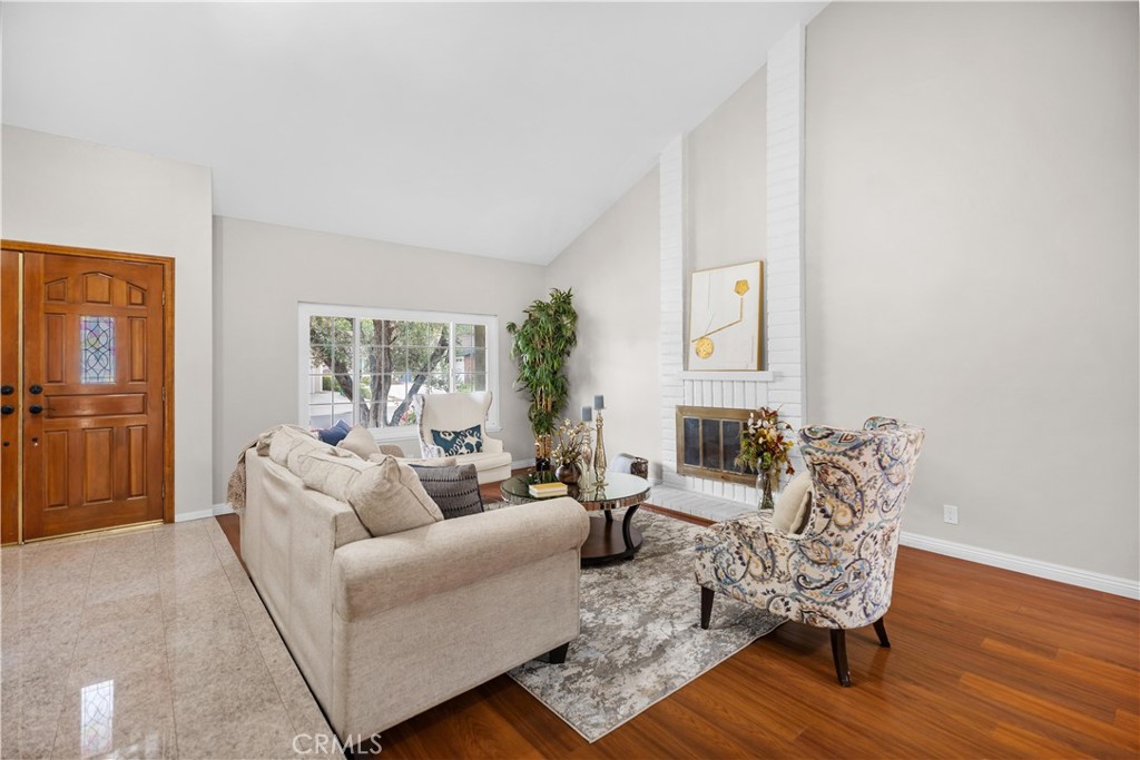 697 Farben Drive Diamond Bar, CA 91765 - Photo 15 of 54 a living room with furniture and wooden floor