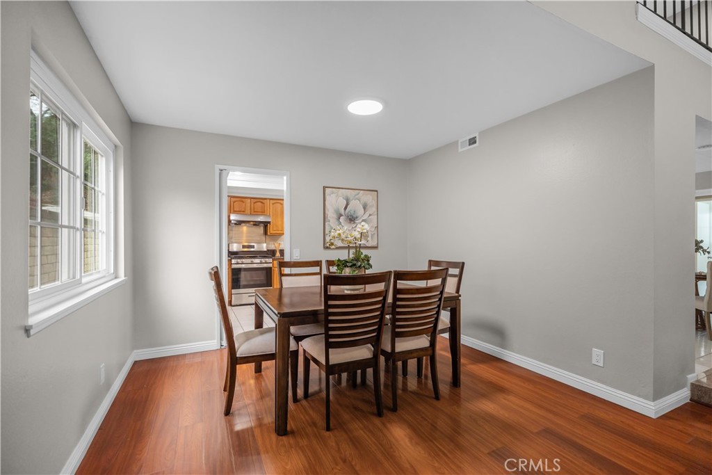 697 Farben Drive Diamond Bar, CA 91765 - Photo 17 of 54 a view of a dining room with furniture and wooden floor