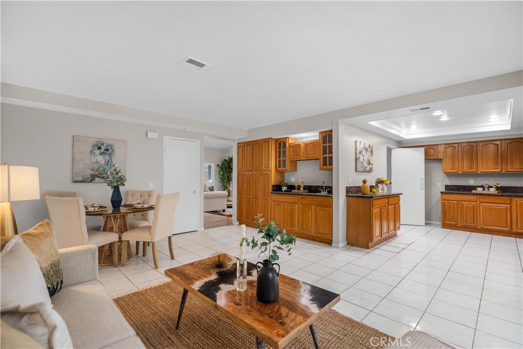 697 Farben Drive Diamond Bar, CA 91765 - Photo 19 of 54 a living room with furniture kitchen view and a dining table