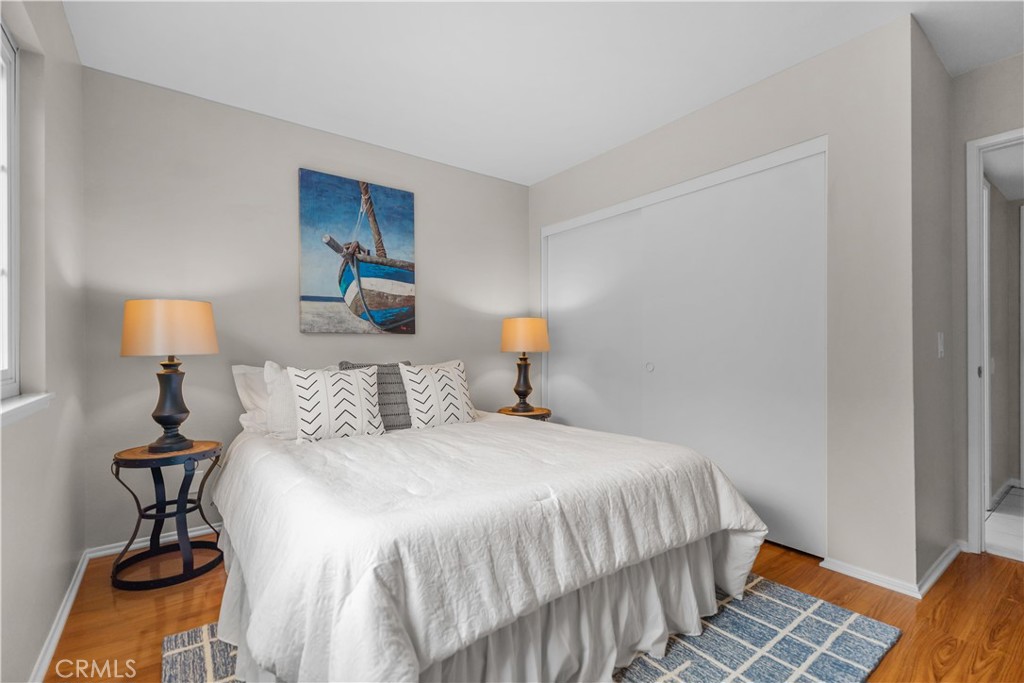 697 Farben Drive Diamond Bar, CA 91765 - Photo 25 of 54 a bedroom with a bed and a lamp on table