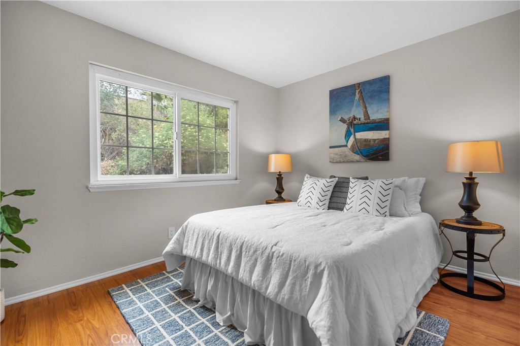 697 Farben Drive Diamond Bar, CA 91765 - Photo 26 of 54 a bedroom with a bed and a window