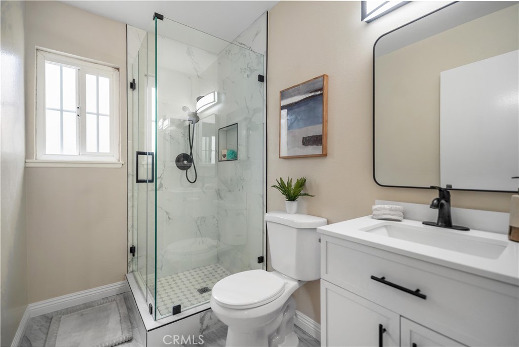 697 Farben Drive Diamond Bar, CA 91765 - Photo 27 of 54 a bathroom with a sink toilet and shower