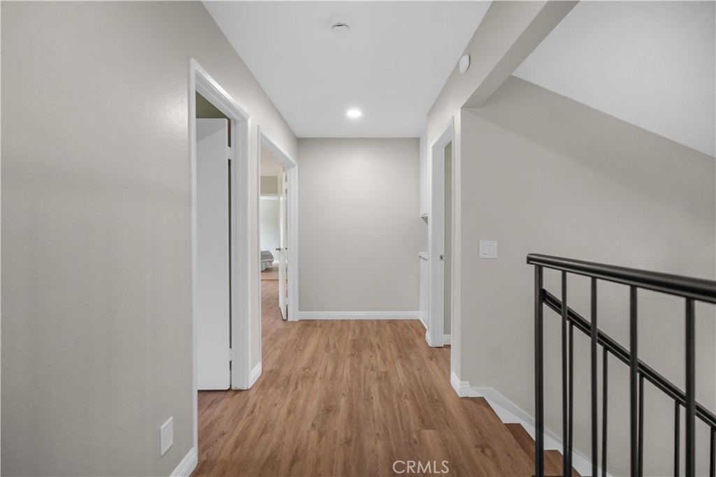 697 Farben Drive Diamond Bar, CA 91765 - Photo 29 of 54 a view of a hallway with wooden floor and staircase