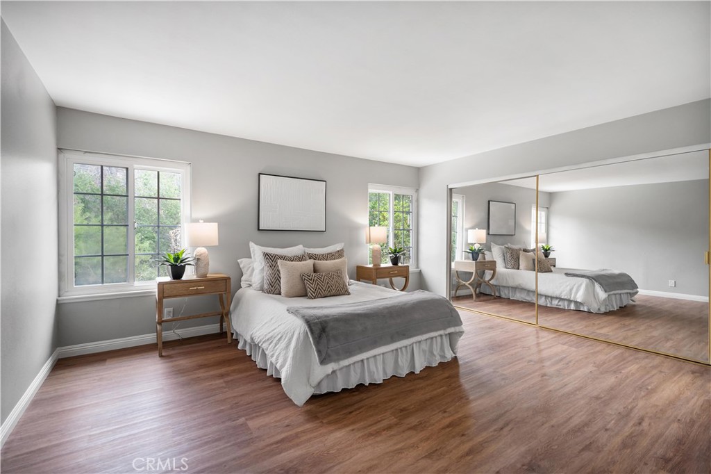 697 Farben Drive Diamond Bar, CA 91765 - Photo 35 of 54 a bedroom with a bed couch and windows