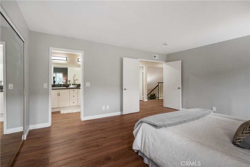 697 Farben Drive Diamond Bar, CA 91765 - Photo 36 of 54 a bedroom with a bed and a view of livingroom