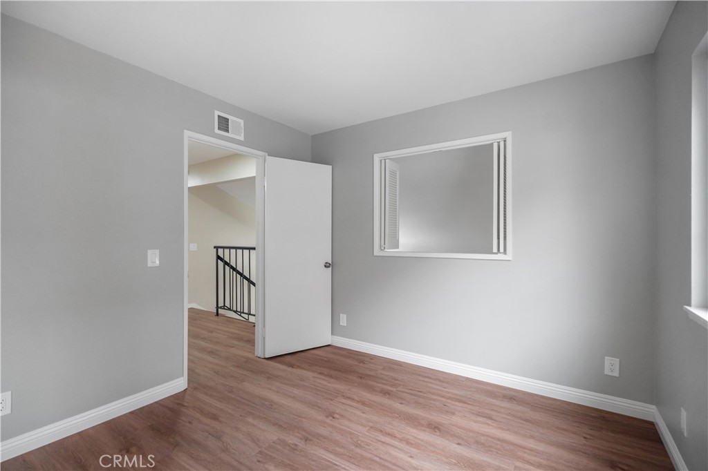 697 Farben Drive Diamond Bar, CA 91765 - Photo 41 of 54 a view of an empty room with wooden floor