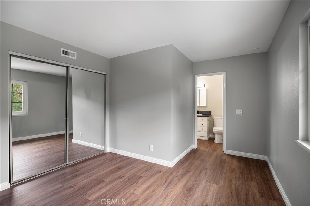 697 Farben Drive Diamond Bar, CA 91765 - Photo 43 of 54 an empty room with wooden floor and closet