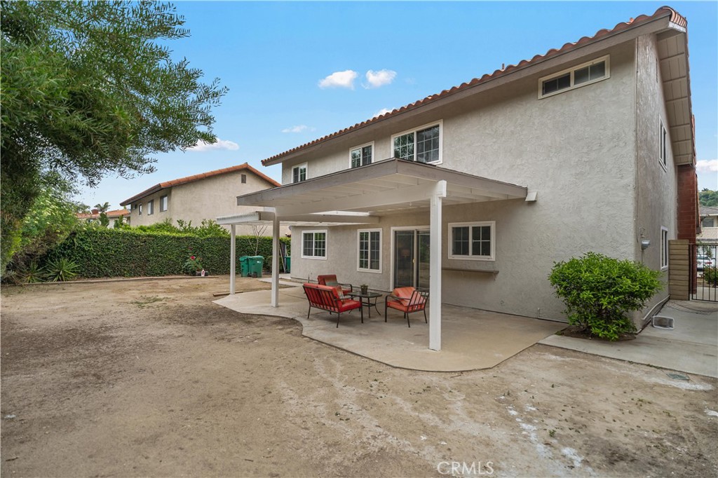 697 Farben Drive Diamond Bar, CA 91765 - Photo 52 of 54 a view of a house with backyard sitting area and garden