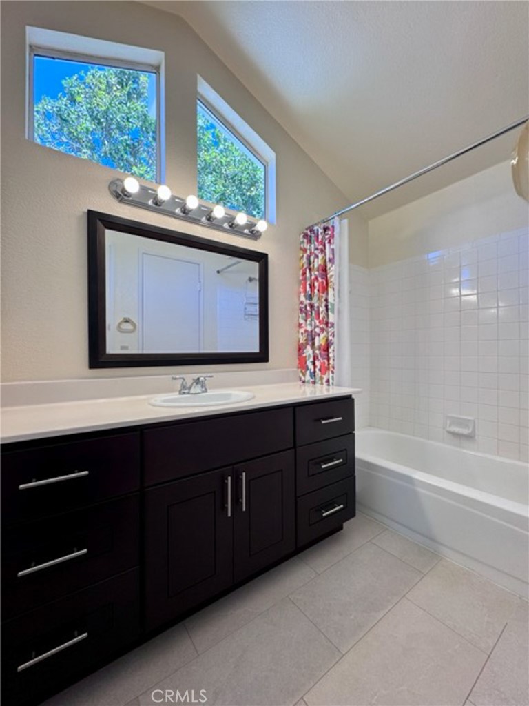 31585 Corte Salinas Temecula, CA 92592 - Photo 26 of 42 a bathroom with a sink vanity and a mirror