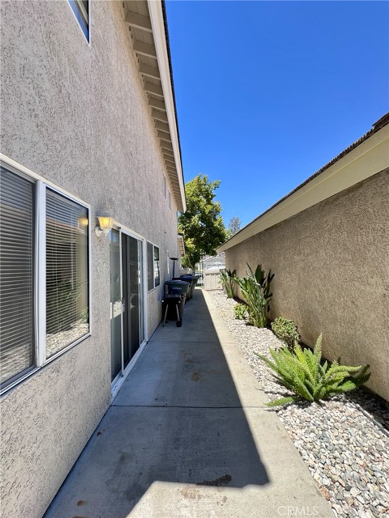 31585 Corte Salinas Temecula, CA 92592 - Photo 38 of 42 a potted plant sitting in front of a building