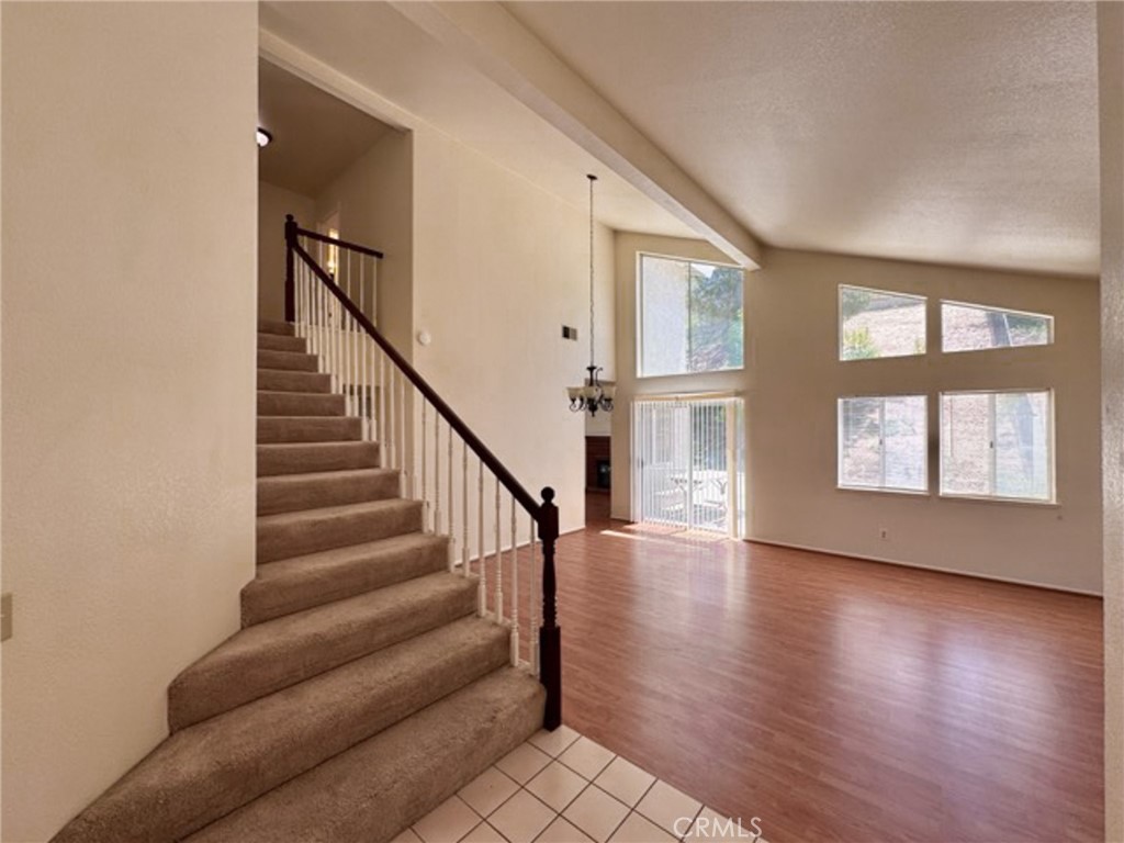 31585 Corte Salinas Temecula, CA 92592 - Photo 7 of 42 a view of an entryway with wooden floor