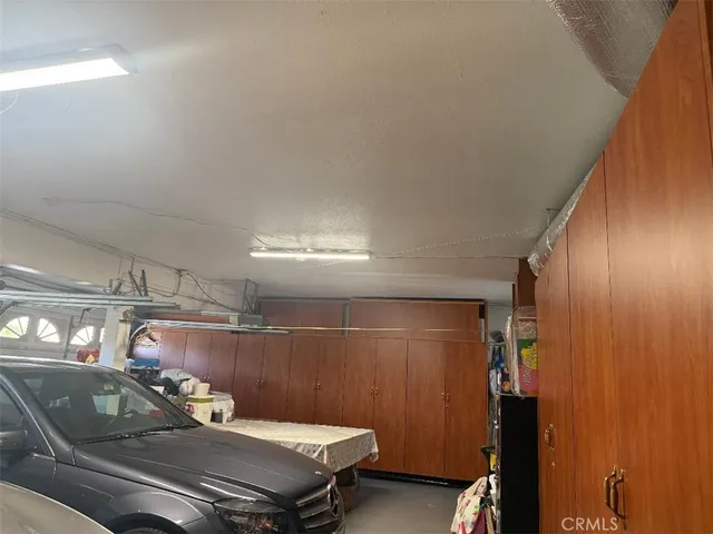 a close view of sink and cabinets